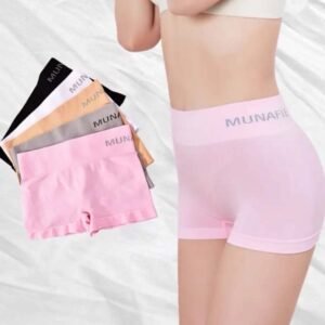A model showcasing Munafie shorts in various colors, including pink, black, gray, orange, and white.