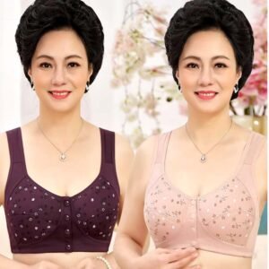 Two variations of a supportive bra displayed on a woman, featuring floral designs, with one in dark purple and the other in light pink.