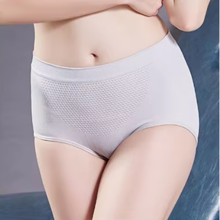 A close-up of a light gray high-waisted brief with a textured pattern, featuring a model's midsection.