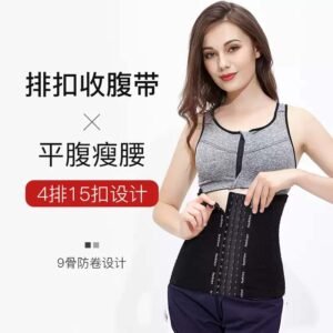 A woman demonstrating a waist trainer slimming belt while wearing a gray sports bra.